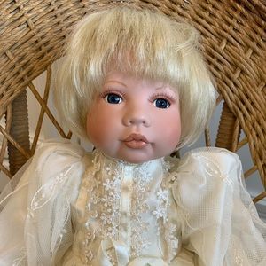 AEL 2001 porcelain doll with soft body and christening gown